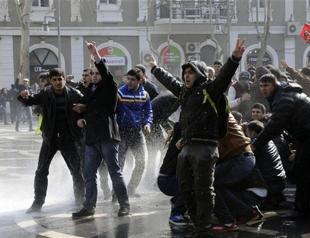 Azerbaijan police break up protest against abuse in army