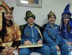 Astronauts return to Earth from space station