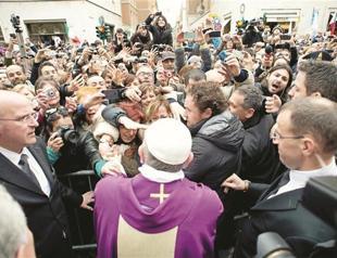 ‘Ordinary’ pope wades into crowd