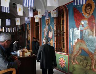 Greek Cypriots show faith in church to save island