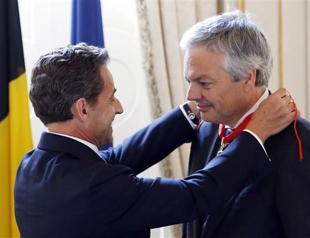 Sarkozy steps out in Belgium, vows no Depardieu