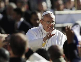 Pope sets tone for humbler papacy, calls for defence of the weak