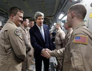 Kerry lands in Kabul on unannounced visit