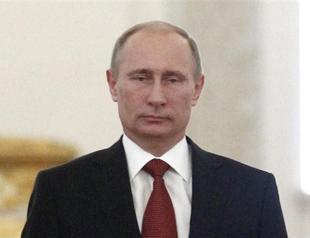 Putin orders cabinet to study restructuring Greek Cyprus loan