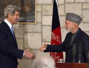 Kerry, Karzai bury hatchet in Kabul meeting