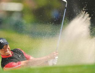 Tiger Woods recaptures world No 1 spot