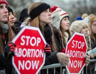 North Dakota governor signs the most restrictive abortion law in the U.S.