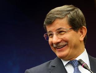 Turkish FM Davutoğlu hosts families of Mavi Marmara victims at dinner
