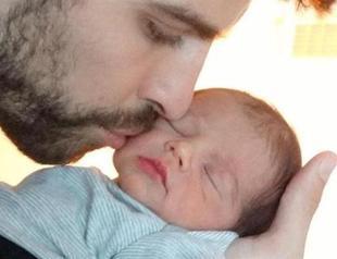 Shakira shows 1st baby photo, with father Pique