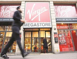 Liberty Global to buy Virgin Media