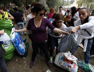 Even BMW drivers seeking aid in crisis-hit Greek Cyprus