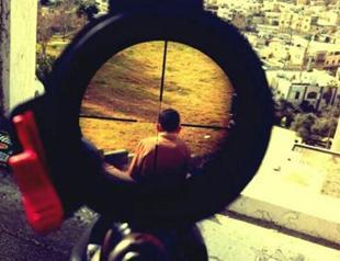 Israeli soldier’s photo of Palestinian boy in crosshairs stirs debate