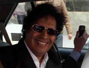 Egypt to try detained Gadhafi cousin, wanted in Libya