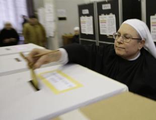 Austerity-hit Italy votes with Europe on tenterhooks