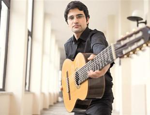 Turkish musician invents a guitar for music of East