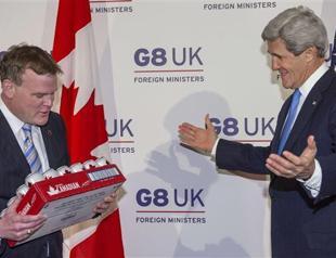 Canada FM loses beer bet to Kerry on ice hockey
