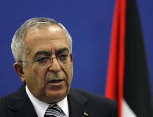 Palestinian president under pressure to back Fayyad