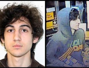 Marathon bomb suspect eludes police, hunt paralyzes Boston