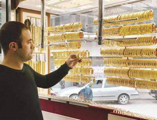 National post office sued for unfair competition over gold sale