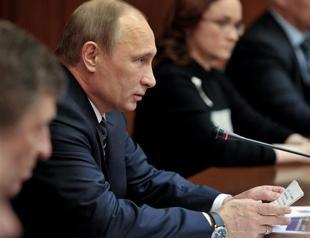 Russias Putin threatens to sack officials over social spending