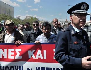 Two arrested in Greece over attack on migrant labourers