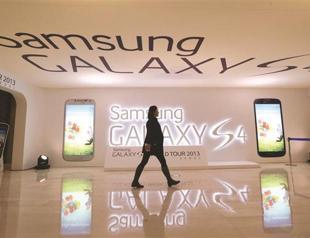 Samsung releases new phone, posts record gain
