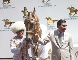 Turkmen president extends personality cult to horse racing