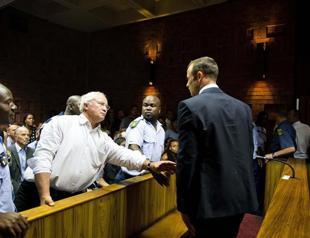 Pistoriuss dad lambasted for racist gun comments