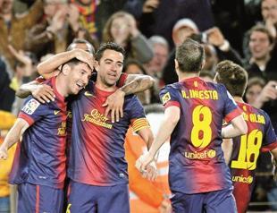 Barcelona clinches league as Real Madrid bows out