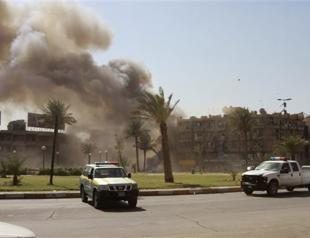 Blasts, clashes kill at least 25 in central Baghdad