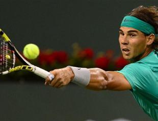 Nadal beats hurting Federer to reach semis