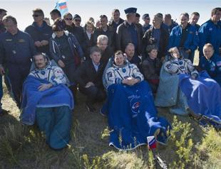 Three astronauts return to Earth after ISS mission
