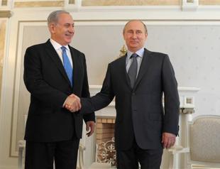 Putin warns against moves that could shake Syria