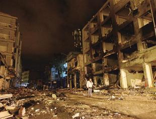 Bombs jolt politics as Turkish PM leaves for US trip