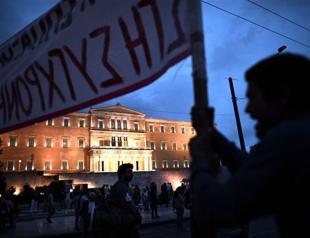 Fitch raises Greek credit rating to B-