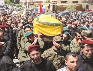 Lebanon leader cautions Hezbollah over Syria role