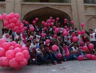 Neon-pink peace balloons bring smiles in war-weary Afghan capital