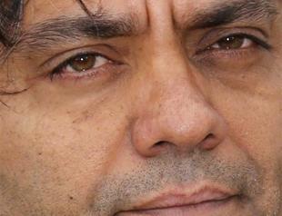 Iranian director facing jail appears in Cannes with Manuscripts Dont Burn