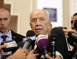 Israels Peres calls for return to peace talks