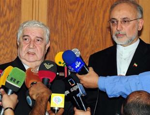 Syria to attend Geneva peace conference, FM says