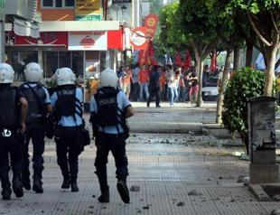 Policeman dies after falling off bridge during protests in Turkey