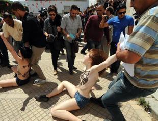 Femen women held in Arab worlds first topless protest