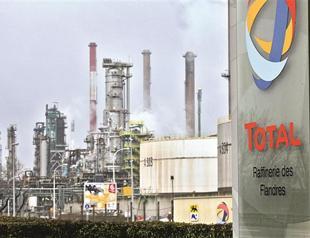 Total to pay $400 million to settle US probe over bribe