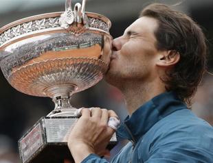 Nadal defies protest to win record eighth French Open