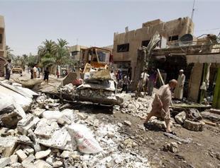 String of bombings kill 13 in Iraq market