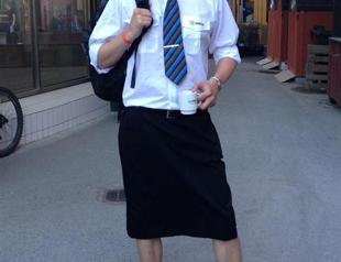 Swedish male train drivers don skirts to beat the heat