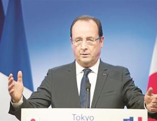 Eurozone crisis over, says French President