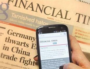 World newspapers mull pay walls for survival