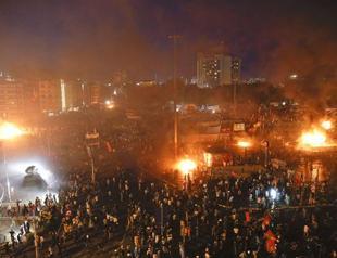 Police use tear gas and enter Taksim Square for second time in day