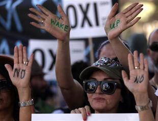 Greek Cypriot Parliament approve EU-IMF bailout deal with a razor-thin majority